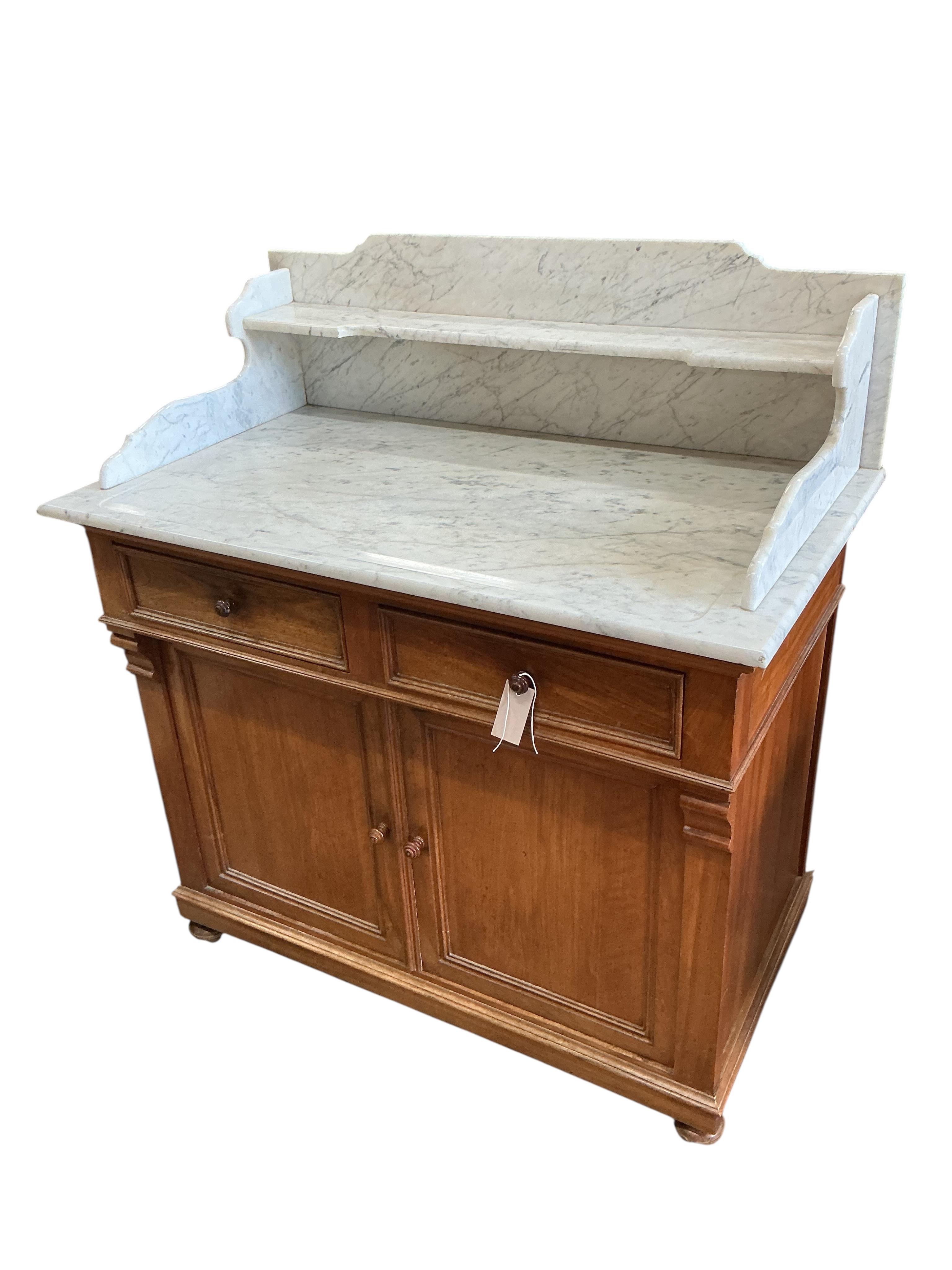 An early 20th century French marble top mahogany washstand, width 100cm, depth 56cm, height 110cm